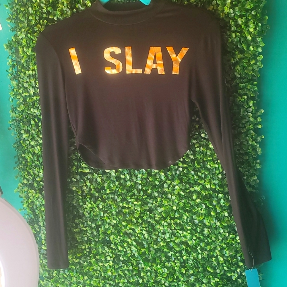 Black long sleeve satin shirt  Written in gold letters Saying "I SLAY'"